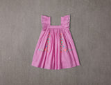 Above knee pink cotton birthday dress with embroidery and ruffle sleeves