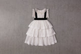 Tiered white cotton Christmas dress with velvet ribbon