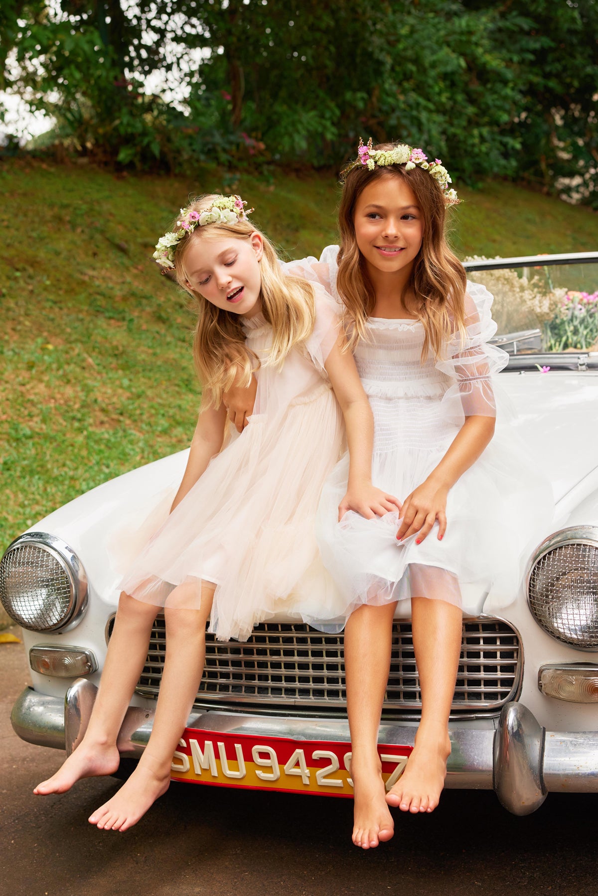 Antoinette Dress | Pink tulle flower girl dress with a ruffle