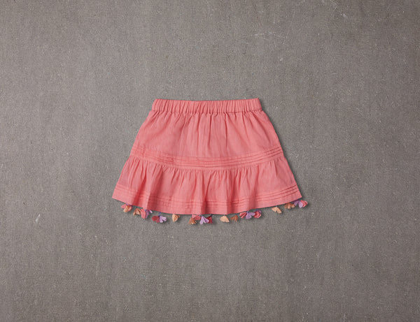 Coral cotton skirt with flower petal tassels