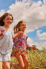 Purple cotton top with colourful flower tassels