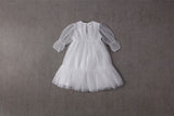White tulle flower girl dress with ruffles