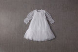 White tulle flower girl dress with ruffles