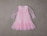 Pink tulle birthday dress with mesh puffed sleeves and ruffles