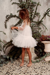 White tulle flower girl dress with ruffles