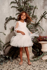 White tulle flower girl dress with ruffles