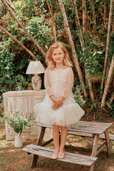 White tulle flower girl dress with ruffles