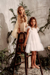 White tulle flower girl dress with a ruffle collar