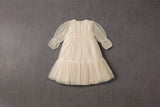 Champagne tulle flower girl dress with ruffles