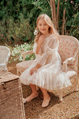 Pink tulle flower girl dress with ribbons