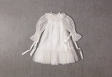 White tulle flower girl dress with ribbons