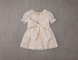 Embroidered beige cotton flower girl dress with smocking