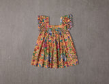 Peach floral cotton birthday dress with tassels