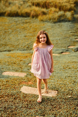 Above knee pink cotton birthday dress with ruffle sleeves and metallic stripes