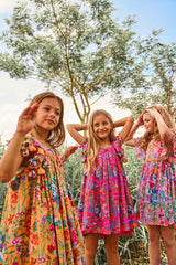 Pink floral cotton birthday dress with tassels