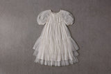 White tulle flower girl dress with puff sleeves