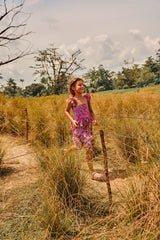 Knee length pink floral cotton birthday dress with pompoms