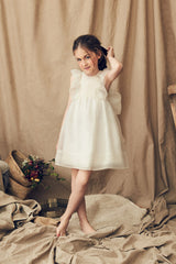 White silk organza flower girl dress with pleats