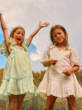 Green cotton birthday dress with ruffles sleeves