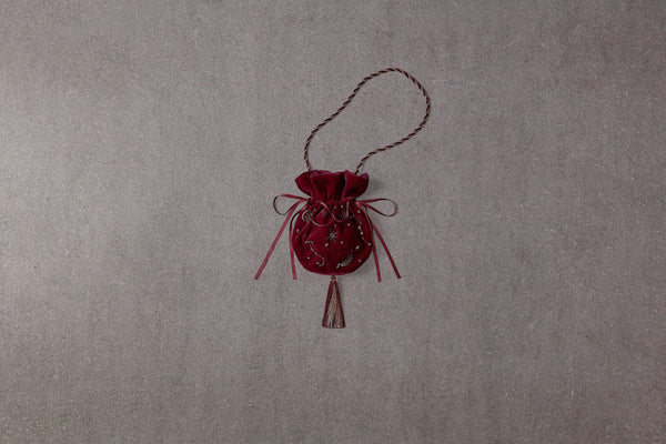 Red velvet bag with satin ribbons