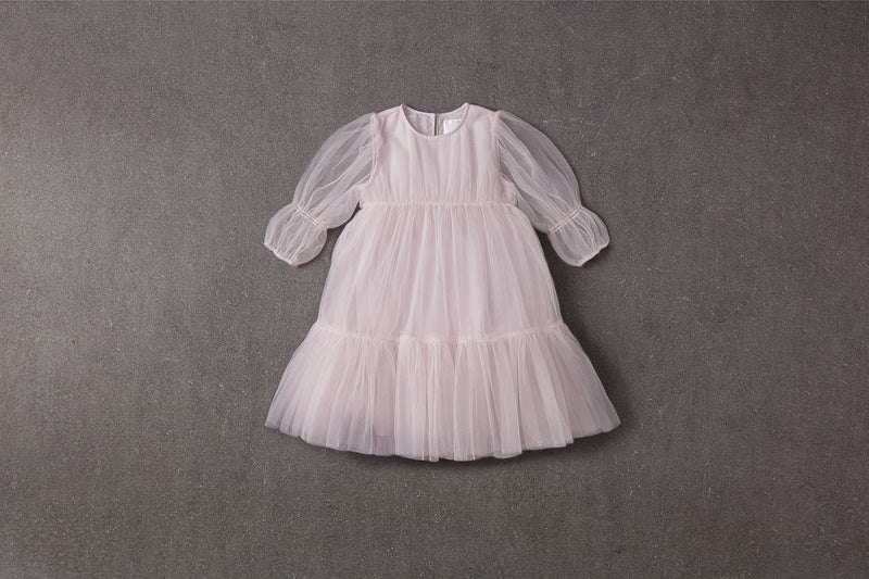 Pink tulle flower girl dress with ruffles