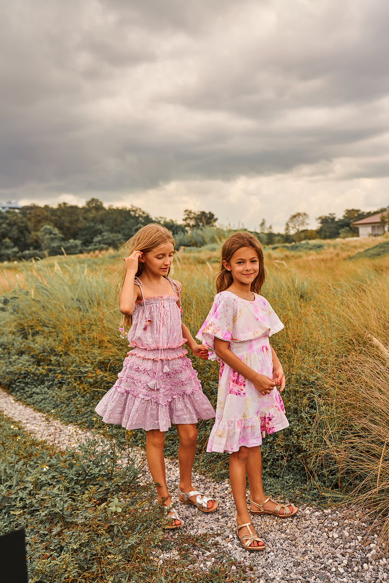 Knee length pink tie dye cotton birthday dress with asymmetrical skirt