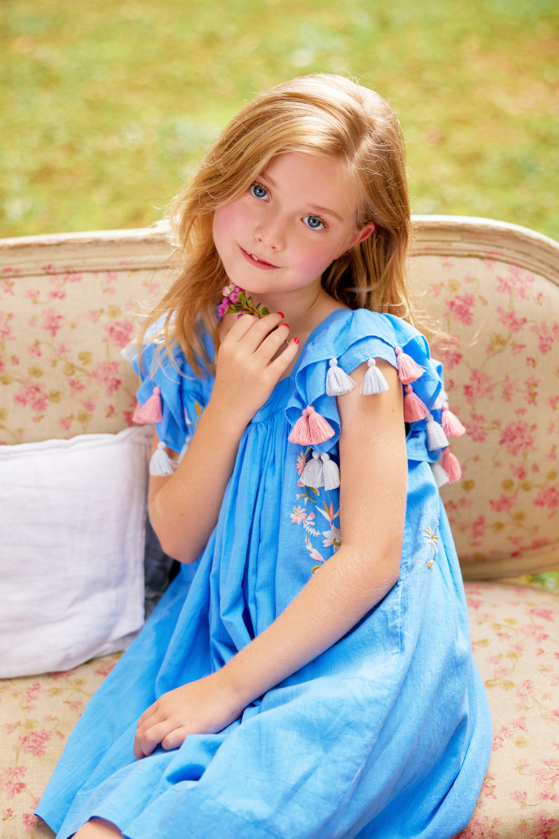 Chloe dress | Embroidered blue cotton summer dress with pompoms NELLYSTELLA Chloe dress | Embroidered blue cotton summer dress with pompoms NELLYSTELLA