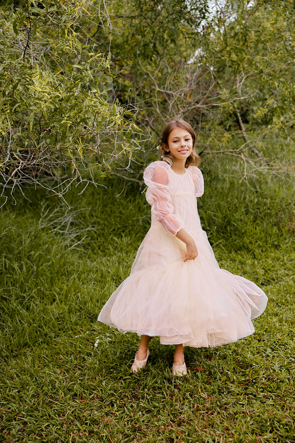 Maxi pink tulle flower girl dress with puff sleeves