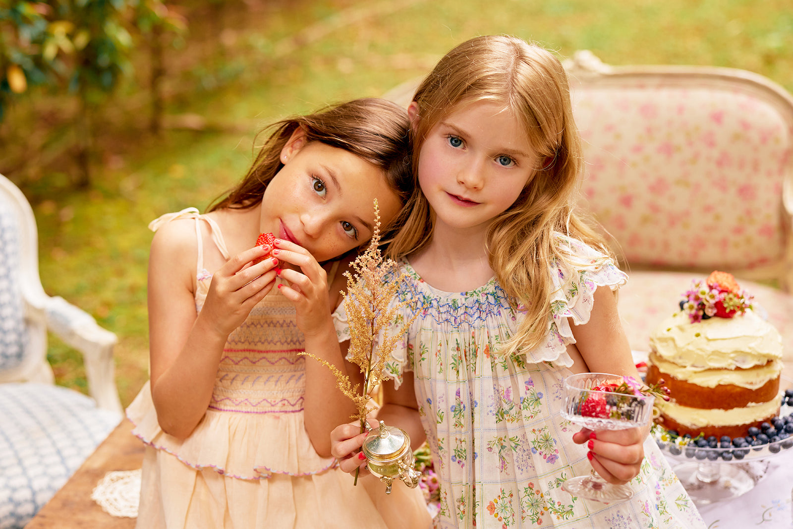 Teagan Dress | Above knee cream floral cotton birthday dress with smocking NELLYSTELLA Teagan Dress | Above knee cream floral cotton birthday dress with smocking NELLYSTELLA