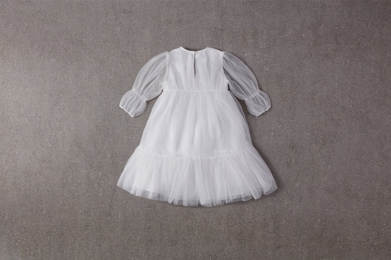White tulle flower girl dress with ruffles