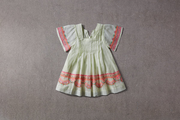 Knee-length yellow cotton birthday dress with embroidery