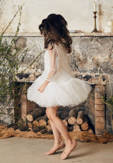 White tulle flower girl dress with ruffles