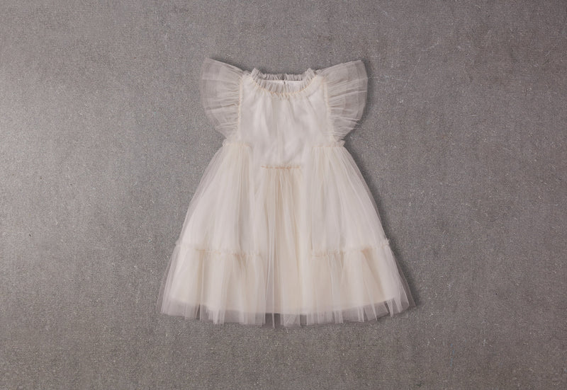Champagne tulle flower girl dress with a ruffle collar