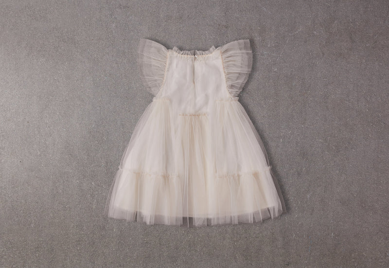 Champagne tulle flower girl dress with a ruffle collar