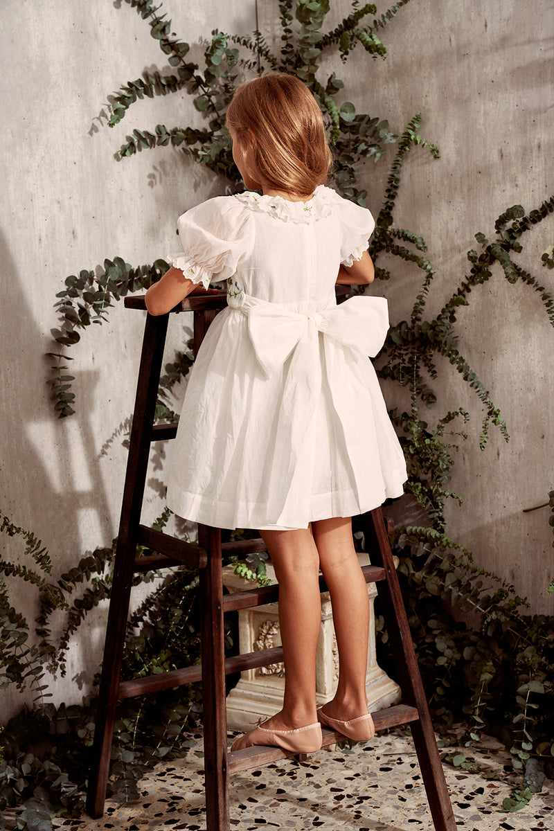 Embroidered white cotton flower girl dress with smocking