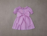 Embroidered purple cotton birthday dress with smocking