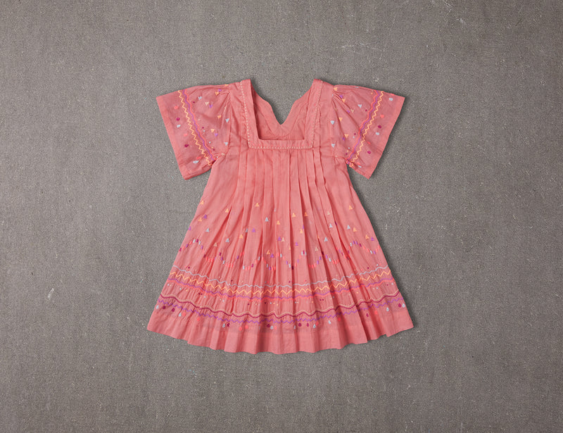 Knee-length peach cotton birthday dress with embroidery