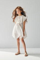 Knee length white cotton handkerchief summer dress with tassels