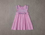 Above knee purple cotton birthday dress with floral embroidery and smocking