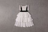 Tiered white cotton Christmas dress with velvet ribbon