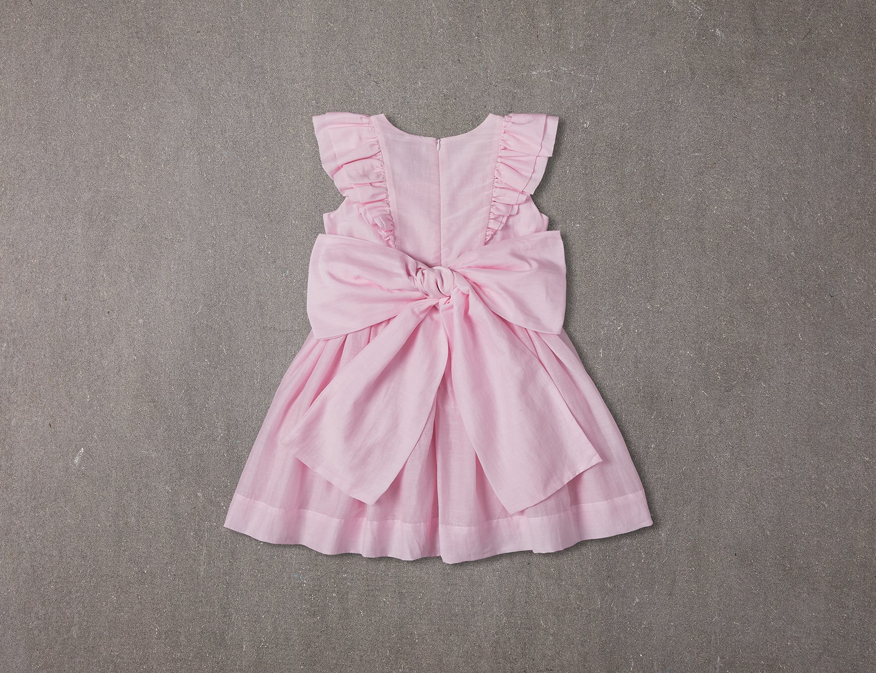 Estelle Dress | Pink birthday dress with hand smocking details