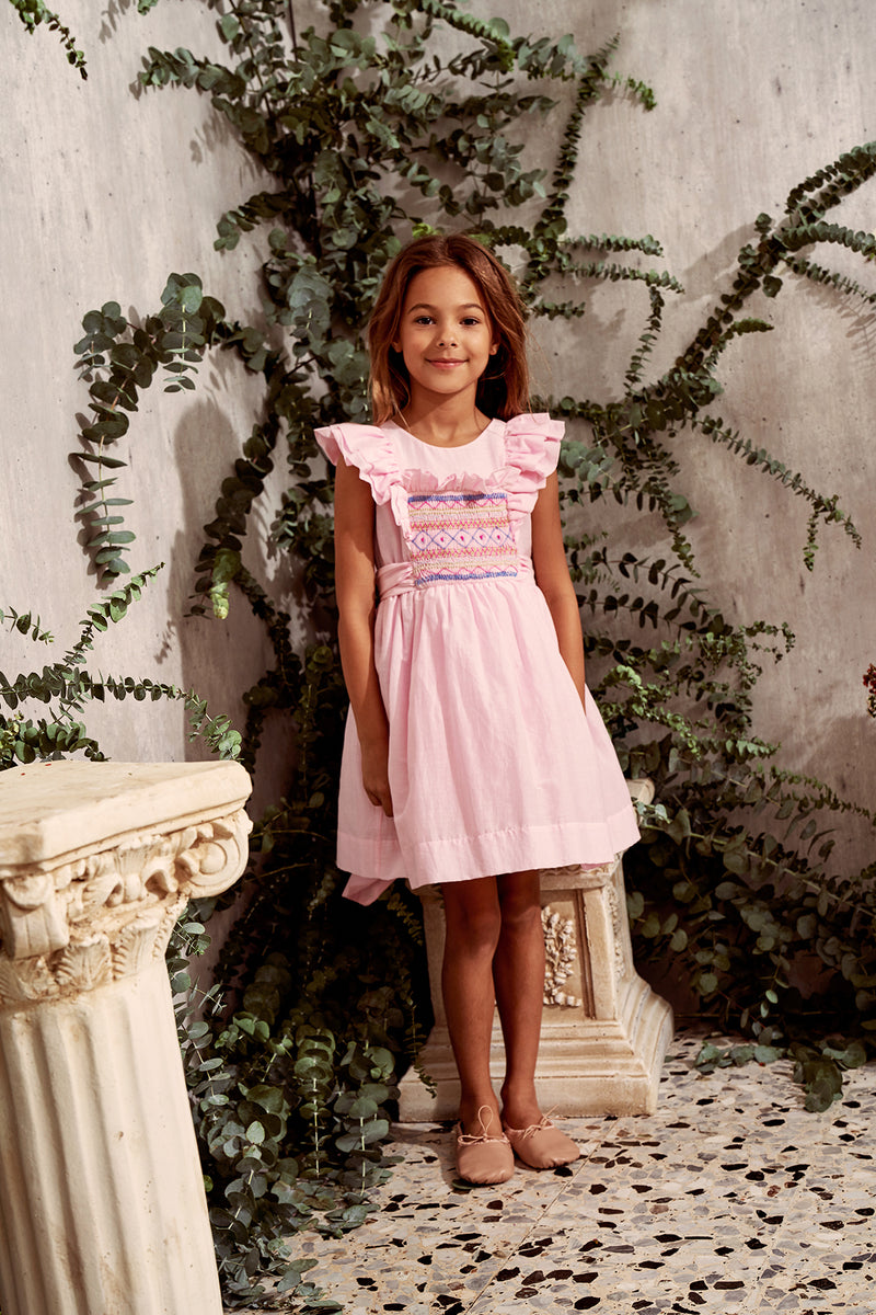 Pink birthday dress with hand smocking details