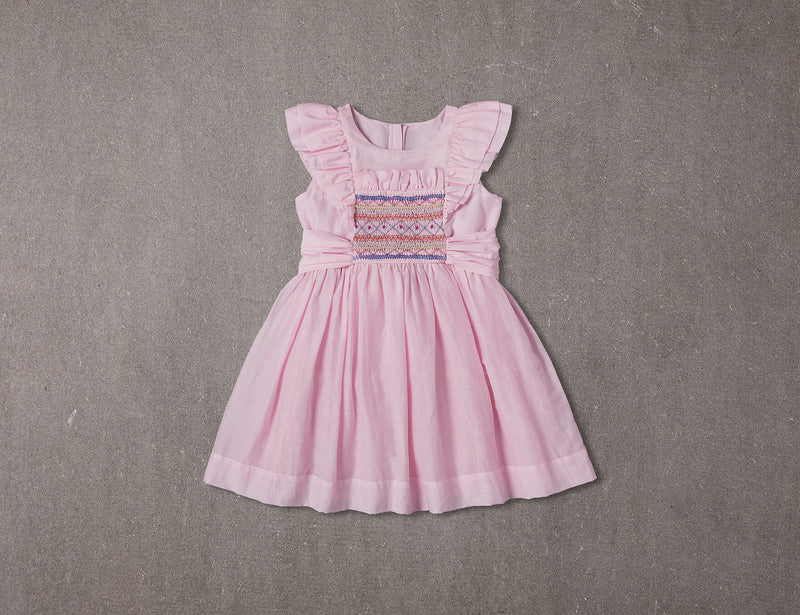 Pink birthday dress with hand smocking details