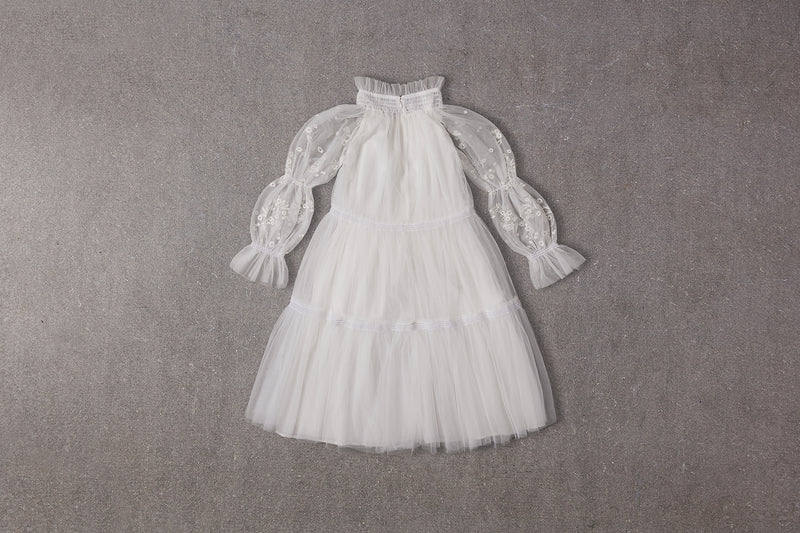 Esther Dress | Flower girl dress with embroidered puffed sleeves in white tulle NELLYSTELLA Esther Dress | Flower girl dress with embroidered puffed sleeves in white tulle NELLYSTELLA