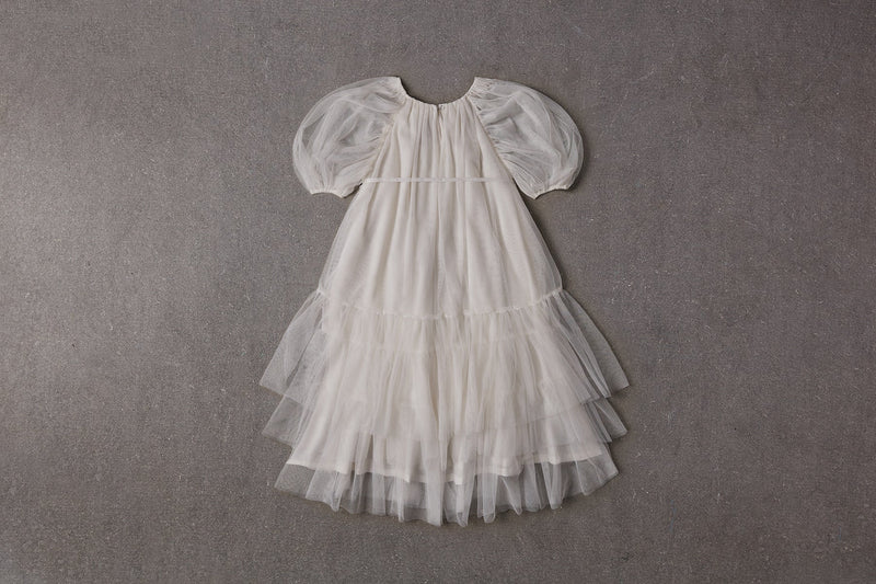 White tulle flower girl dress with puff sleeves