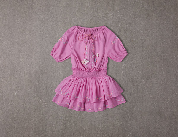 Above knee tiered pink cotton birthday dress with pompoms