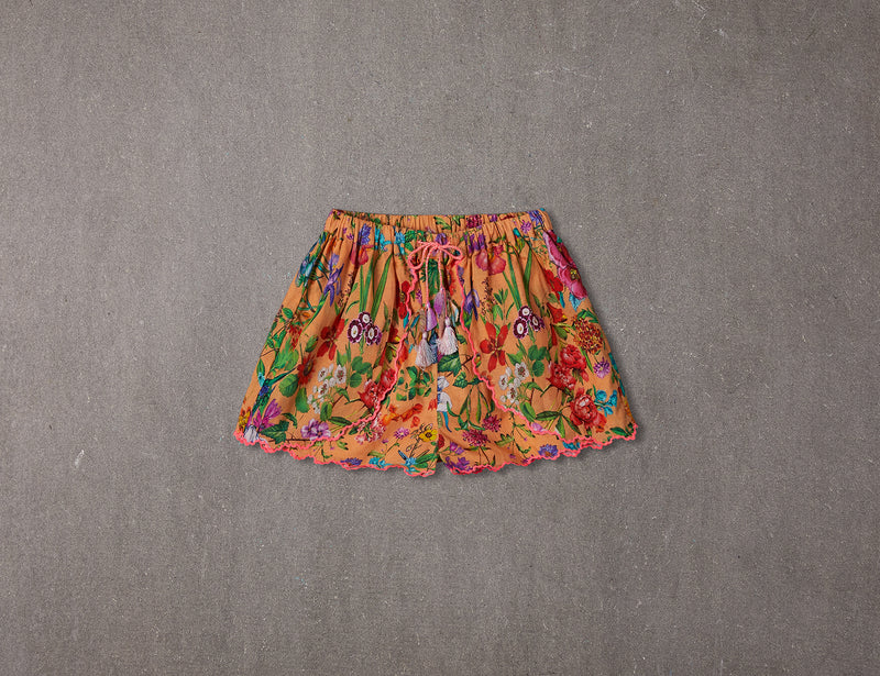 Peach cotton shorts with multi-coloured tassels