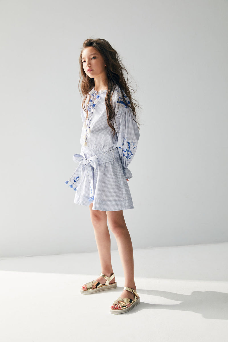 Above knee embroidered white and blue checkered birthday tunic with tassels