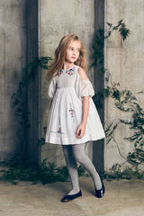 Blue cotton birthday dress with cut-out puff sleeves