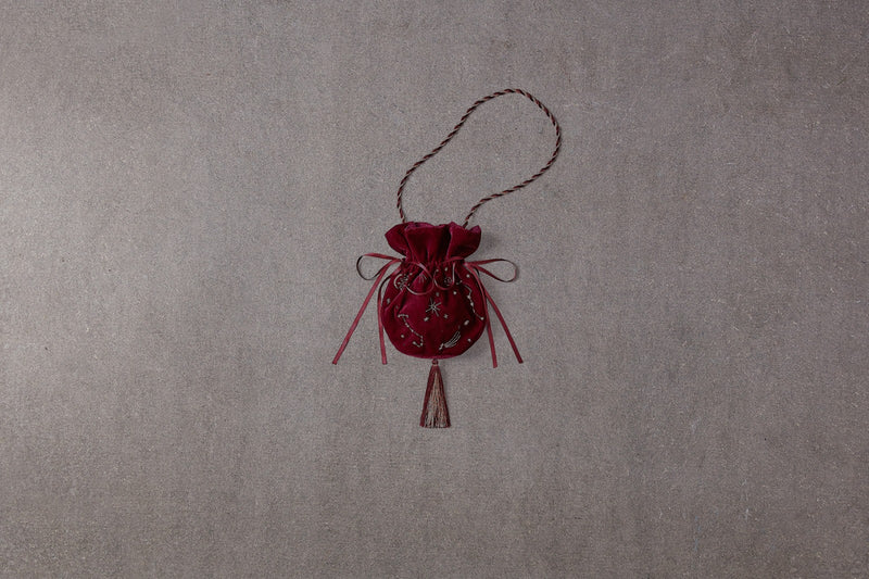 Red velvet bag with satin ribbons